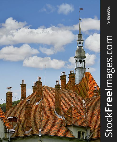 Medieval castle roof over sky background