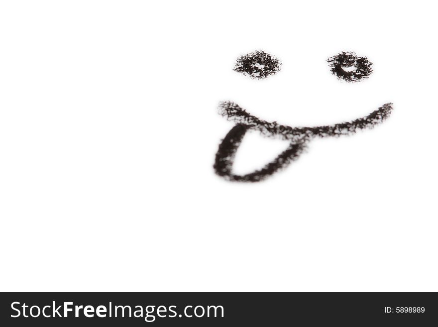 Crayon drawing of a face with tongue sticking out. Plenty copyspace. Crayon drawing of a face with tongue sticking out. Plenty copyspace.