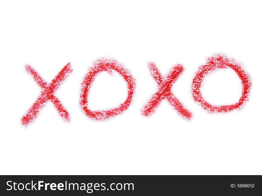 Red crayon sketch of x's and o's symbolizing hugs and kisses