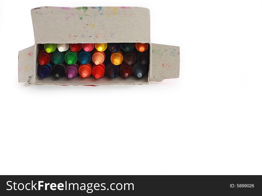 Box of old crayons isolated on white. Box of old crayons isolated on white.