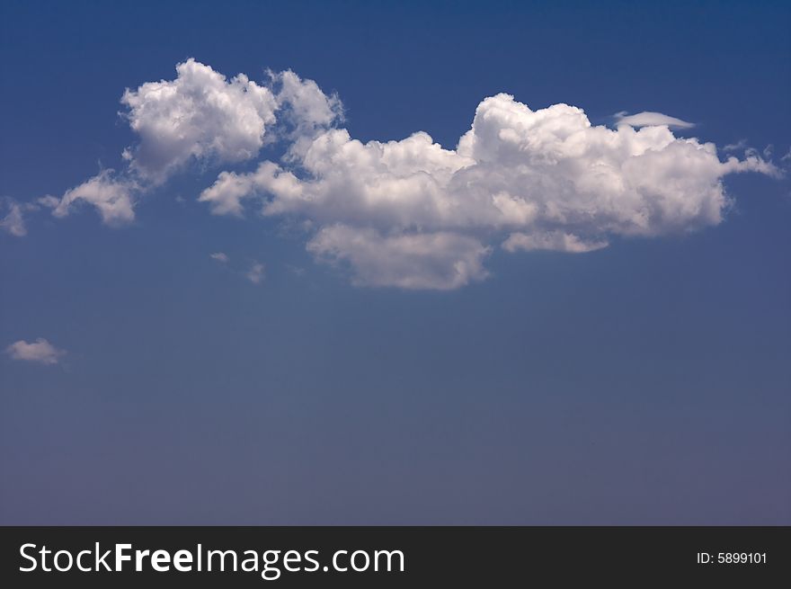 Puffy Clouds on a blue sky.