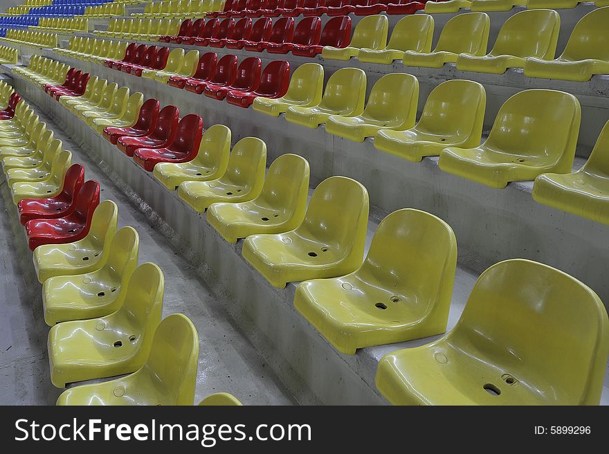 Rows of newly built stadium chairs