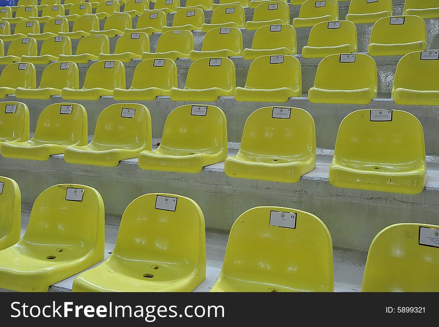 Rows of newly built stadium chairs