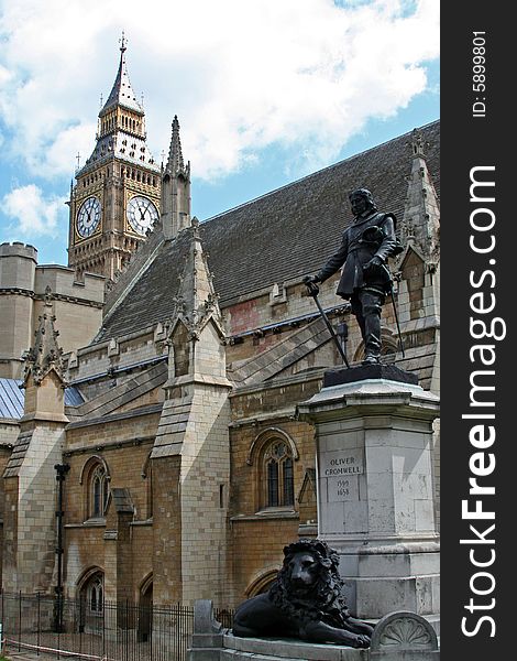 Statue of Oliver Cromwell at British Parliament with Big Ben towering behind. Statue of Oliver Cromwell at British Parliament with Big Ben towering behind