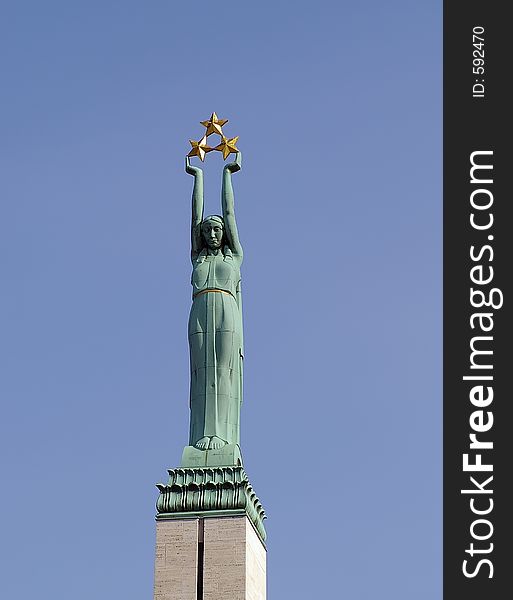 Statue of liberty in Riga dedicated To Fatherland and Freedom. The Monument was executed by Kârlis Zâle (1888-1942), a well-known Latvian sculptor. Ernests Shtalbergs was the architect . The monument is topped by a Liberty Statue, a woman with three stars symbolizing regional parts of Latvia: Kurzeme, Vidzeme and Latgale.