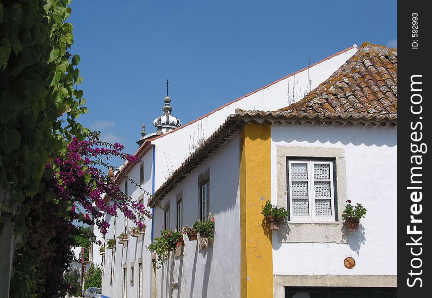 Old village of Ã“bidos,Portugal,inside the walls of a castle. A delight for the visitors. Old village of Ã“bidos,Portugal,inside the walls of a castle. A delight for the visitors.