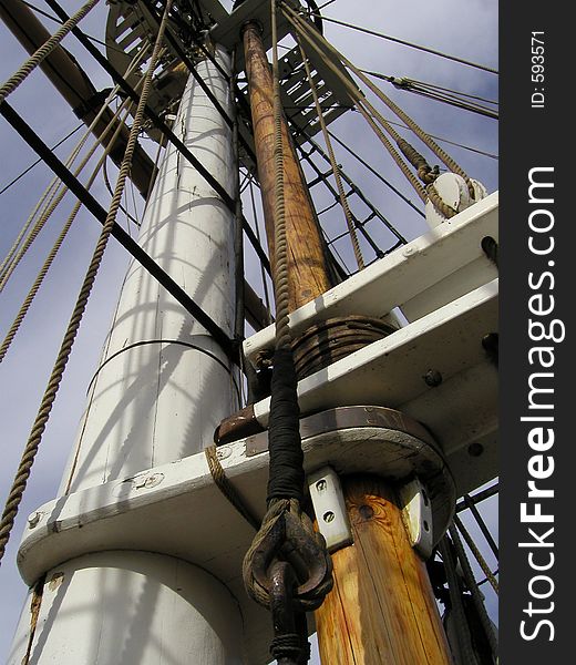 Historic wooden sailboat mast and rigging. Historic wooden sailboat mast and rigging