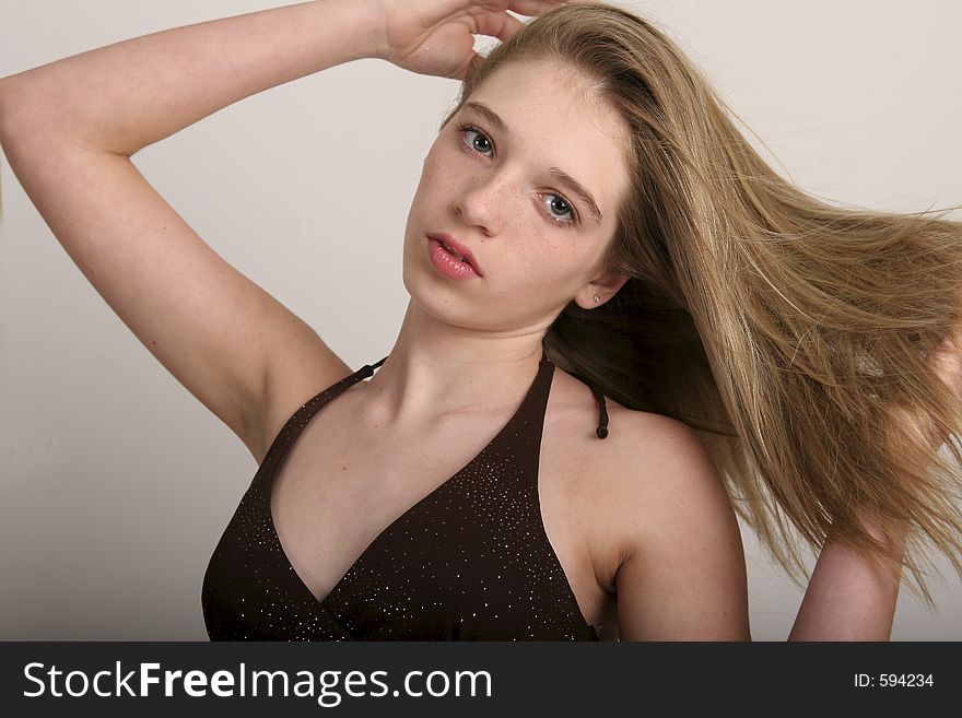 Portrait of a teenage girl with long brown hair. Portrait of a teenage girl with long brown hair