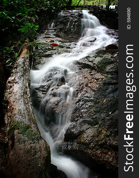 Water running down a waterfall. Water running down a waterfall