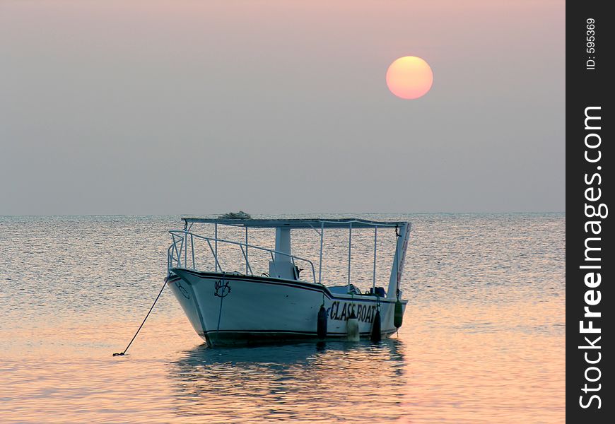 Boat at sunrise