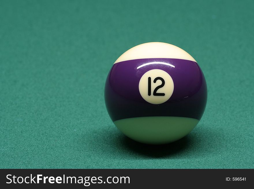 Pool ball number 12 in pool table