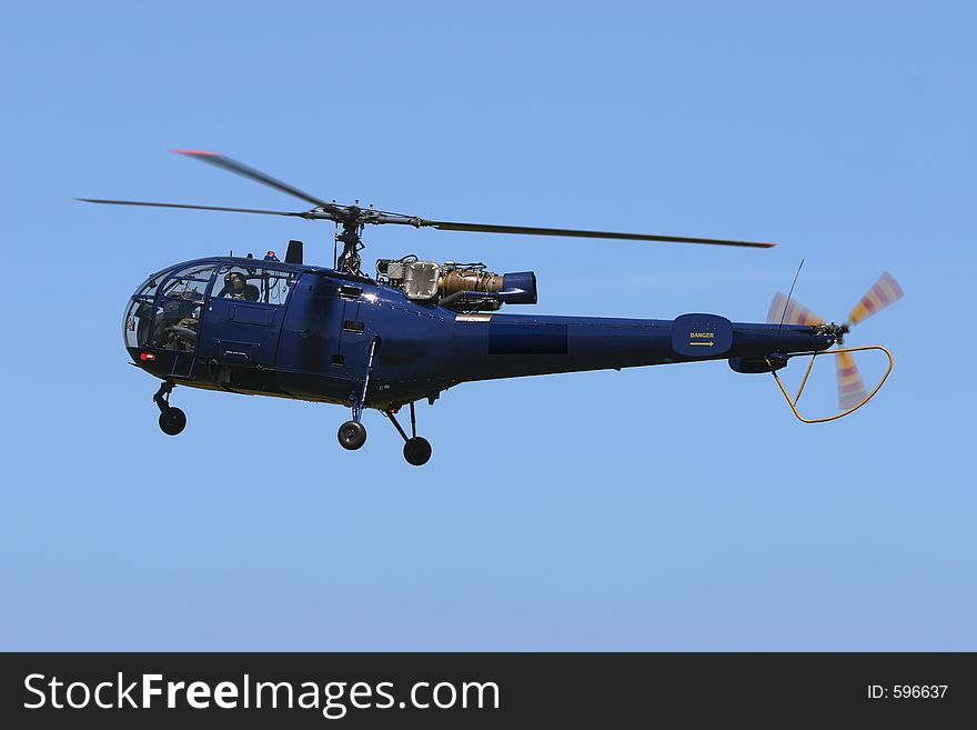 Alouette III helicopter making a fly-by