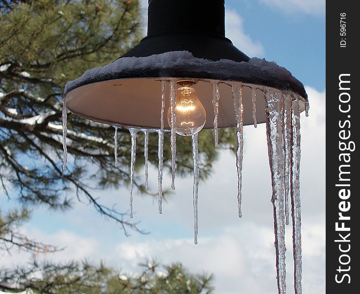 A lamp covered with ice. A lamp covered with ice