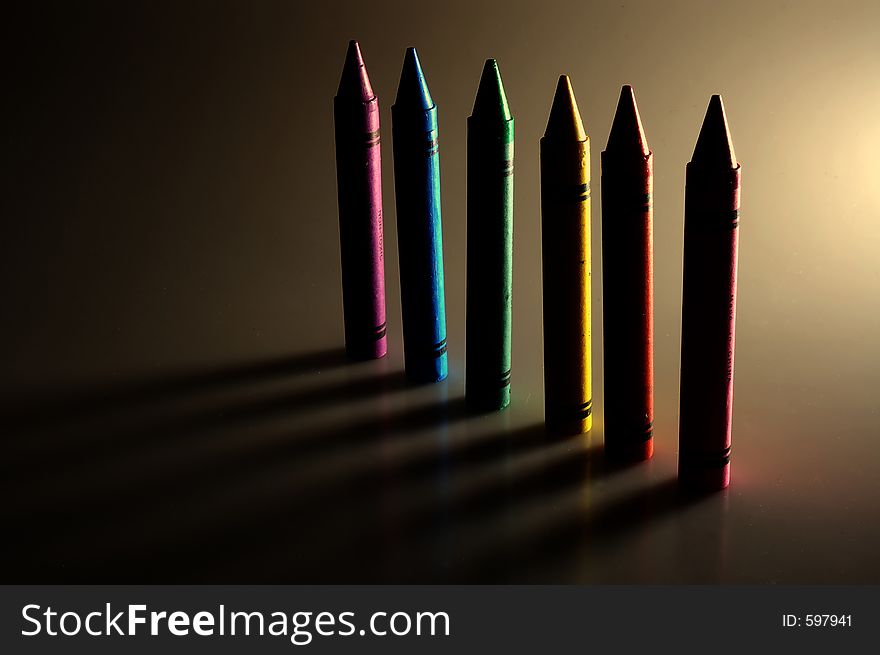 Line of brightly colored crayons. Line of brightly colored crayons