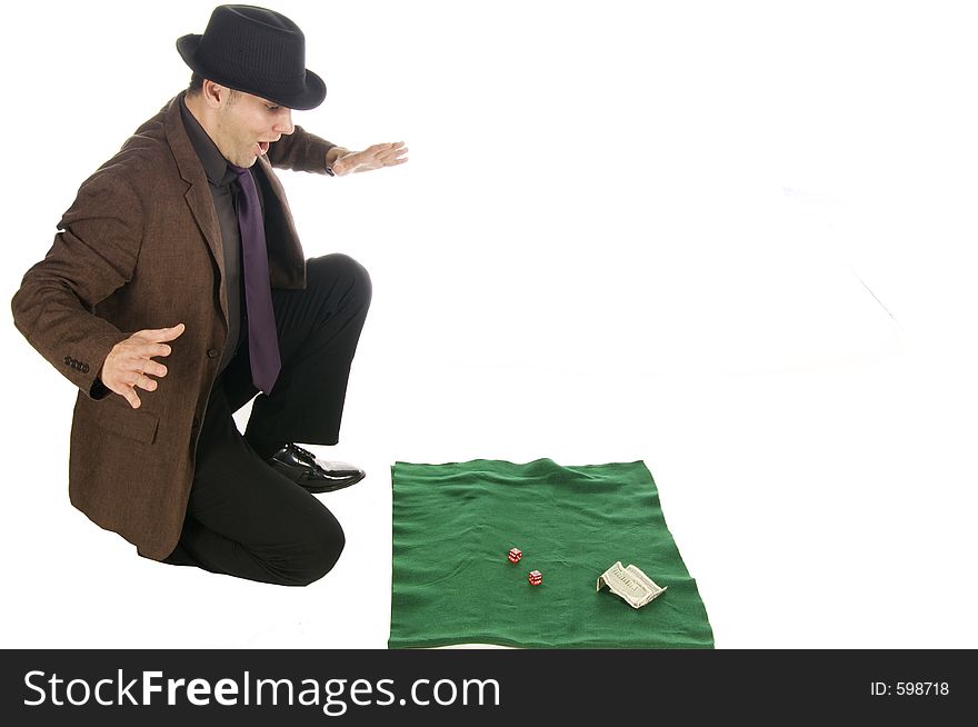 Slick mobster throwing the dice, isolated on white. Slick mobster throwing the dice, isolated on white