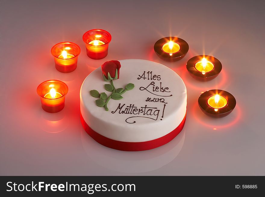 Mothersday tart surrounded by candles. Mothersday tart surrounded by candles