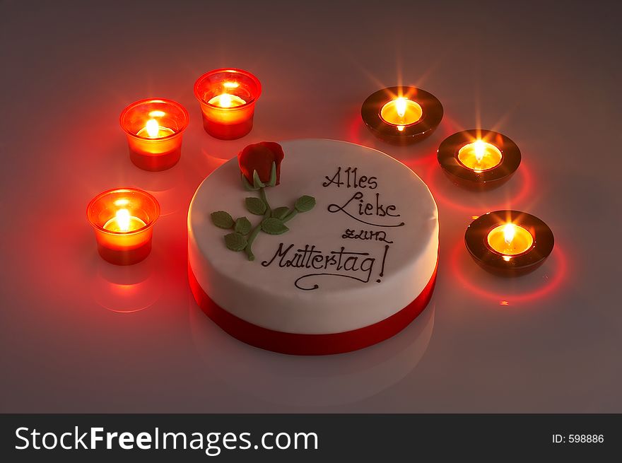 Mothersday tart surrounded by candles. Mothersday tart surrounded by candles