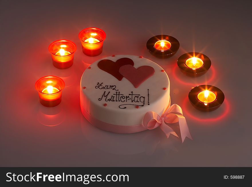 Mothersday tart surrounded by candles. Mothersday tart surrounded by candles