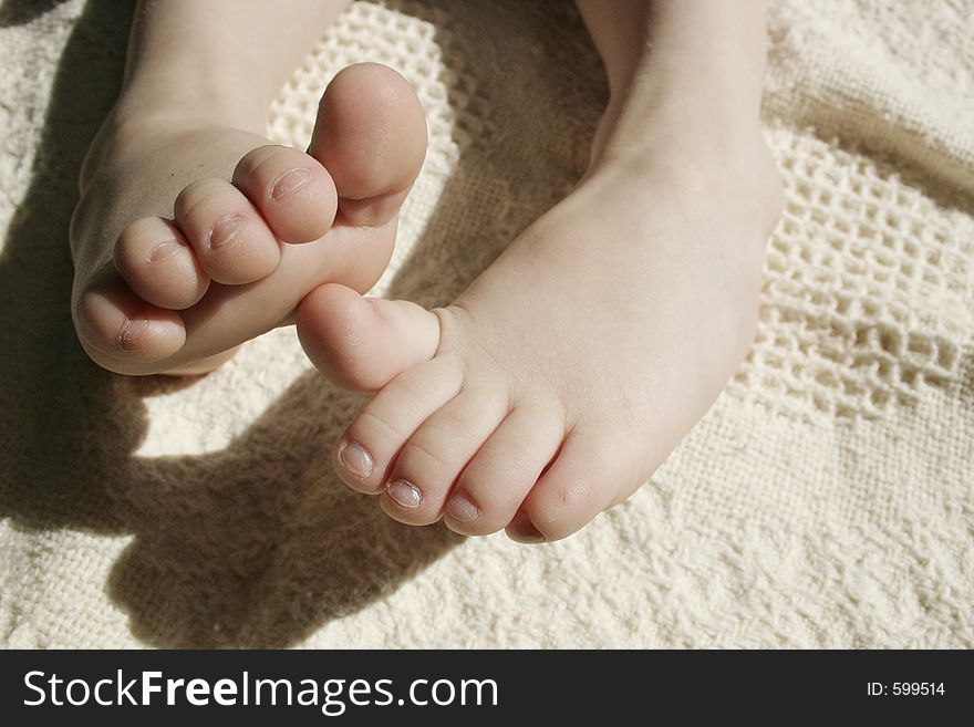 Toddler wiggeling toes. Toddler wiggeling toes