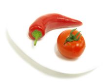 Hot Chili Pepper And Fresh Tomato Royalty Free Stock Image