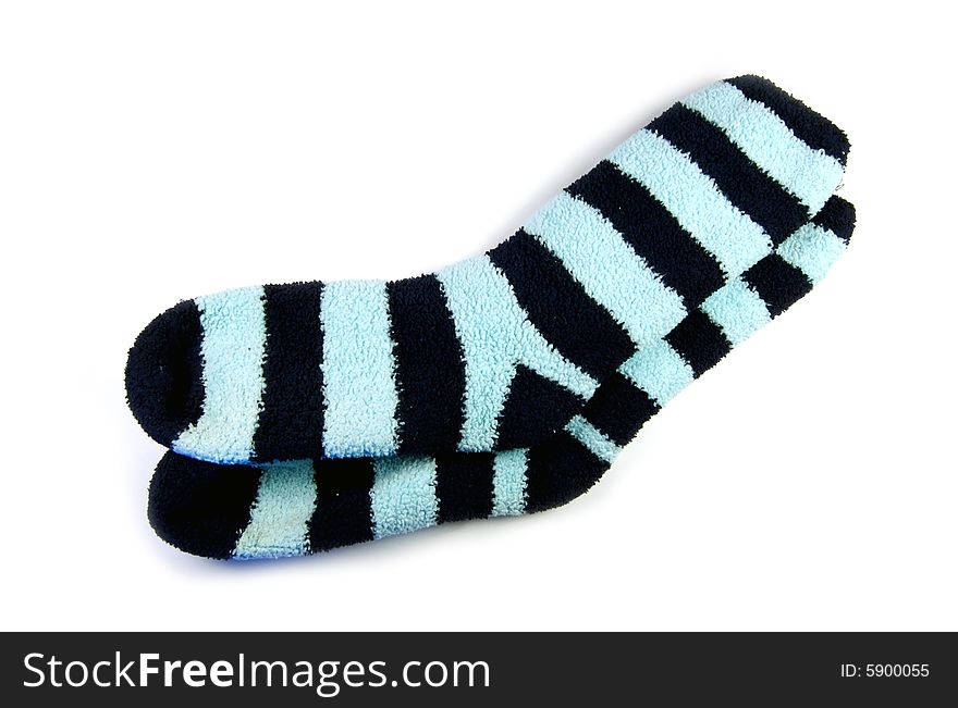 A photograph of striped socks against a white background