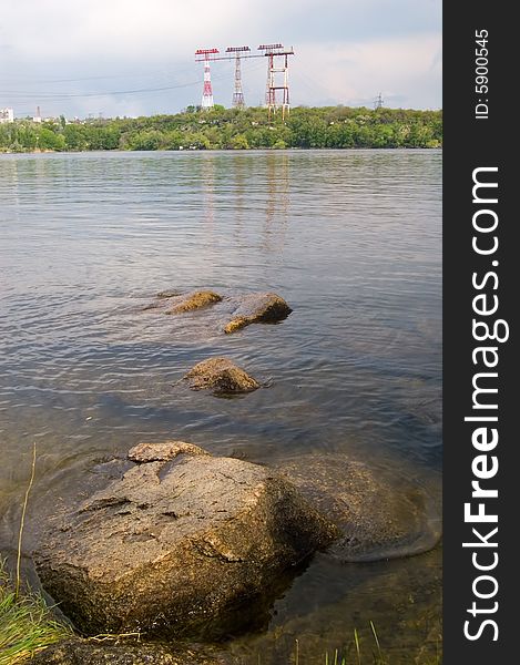 The river, stone and an electric main