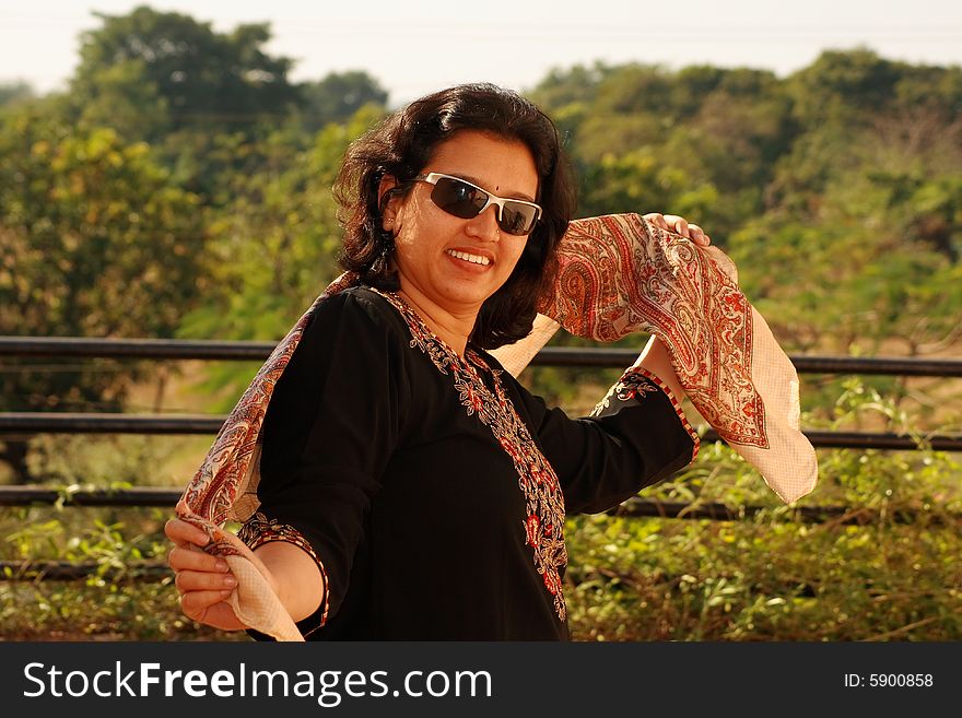 A young Indian woman dancing in an extremely romantic mood.