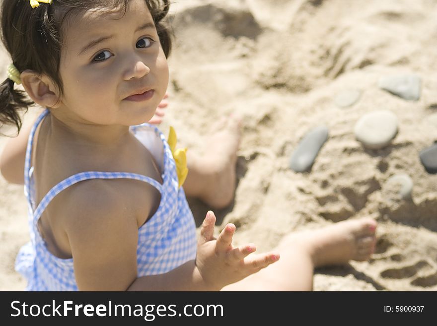 Girl Building A Sand Castle