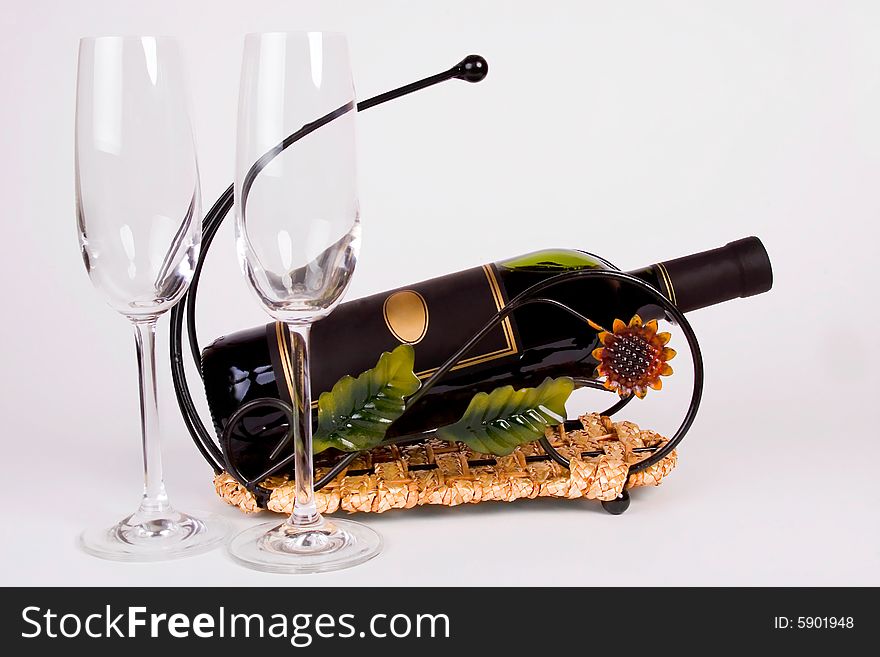 Bottle of Wine and two glasses, on white