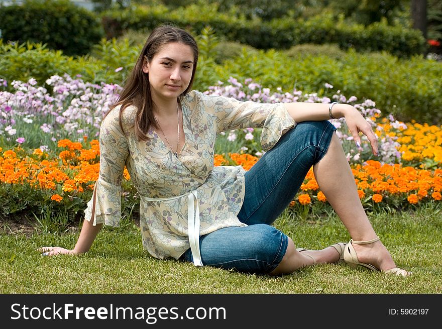 Attractive girl in a city park