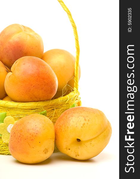 Fresh appetizing apricots on a white background. Fresh appetizing apricots on a white background