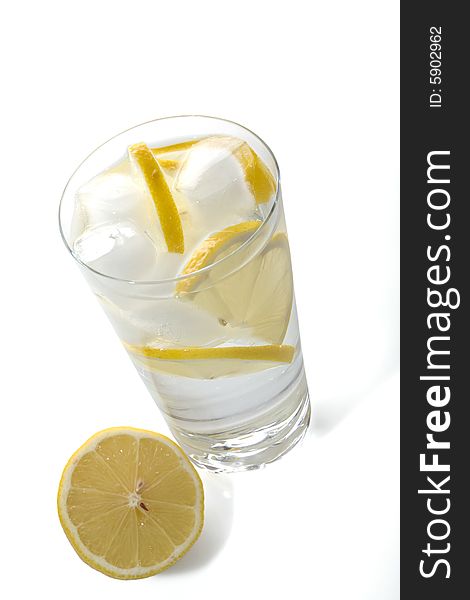 Glass of cold water on white background