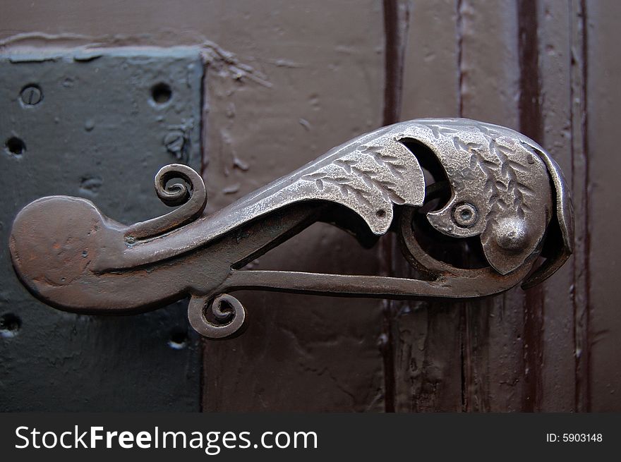 Old rusty door handle, rusty metal