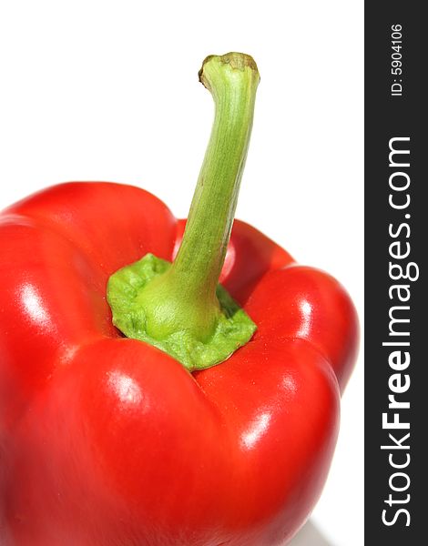 Extreme close-up of red pepper against white background. Extreme close-up of red pepper against white background