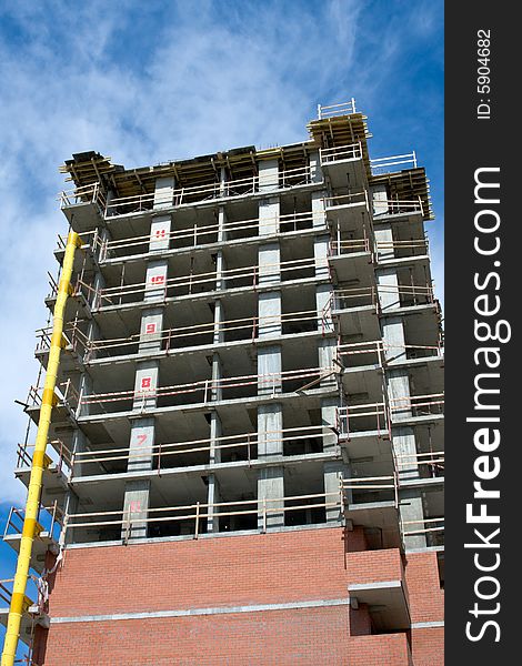 House under construction on the sky background