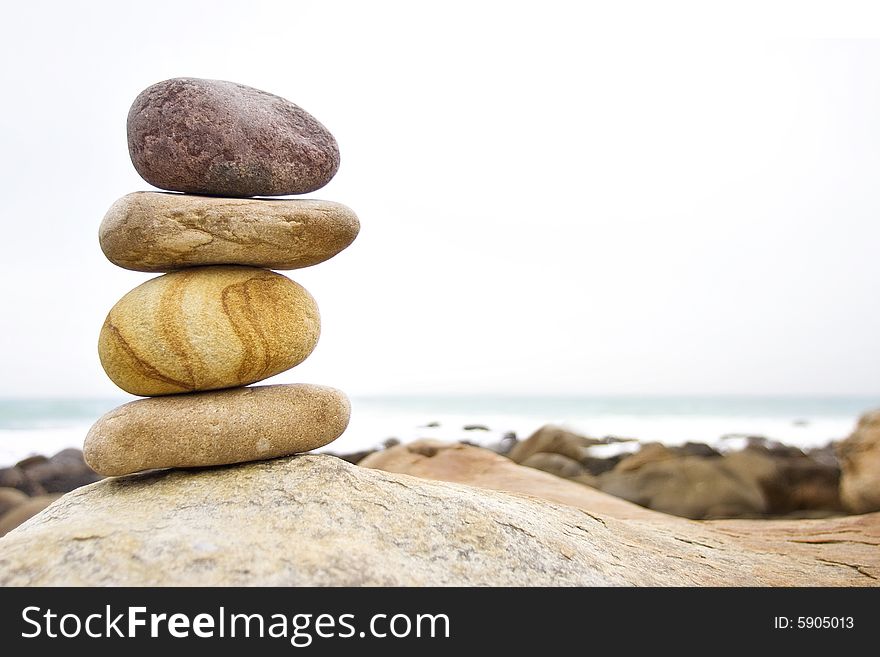 Stacked Stones In A Coastal Setting