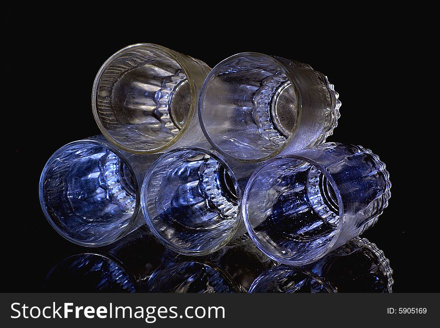 Still life with five glass on black background. Still life with five glass on black background.