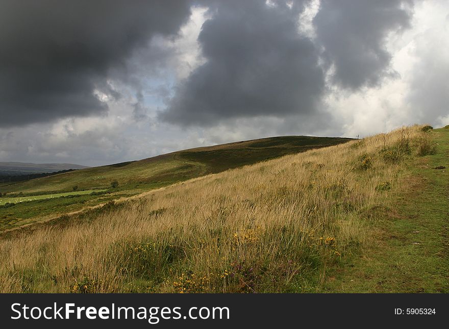 Dark clouds above cefn Bryn Wales