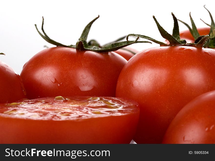 Fresh tomatoes with water drops.
