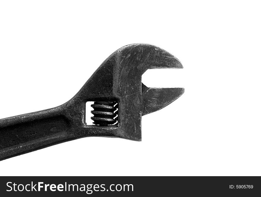 Steel wrench on white background