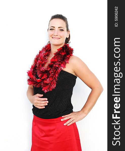 Portrait of a beautiful young brunette woman with tinsel for Christmas - isolated. Portrait of a beautiful young brunette woman with tinsel for Christmas - isolated.