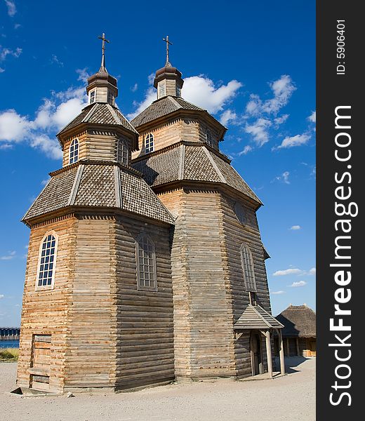 Old wooden orthodox church and blue sky. Old wooden orthodox church and blue sky