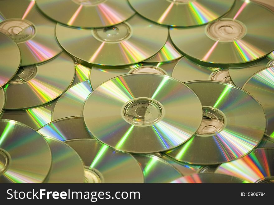 A close up of a lot of compact discs
