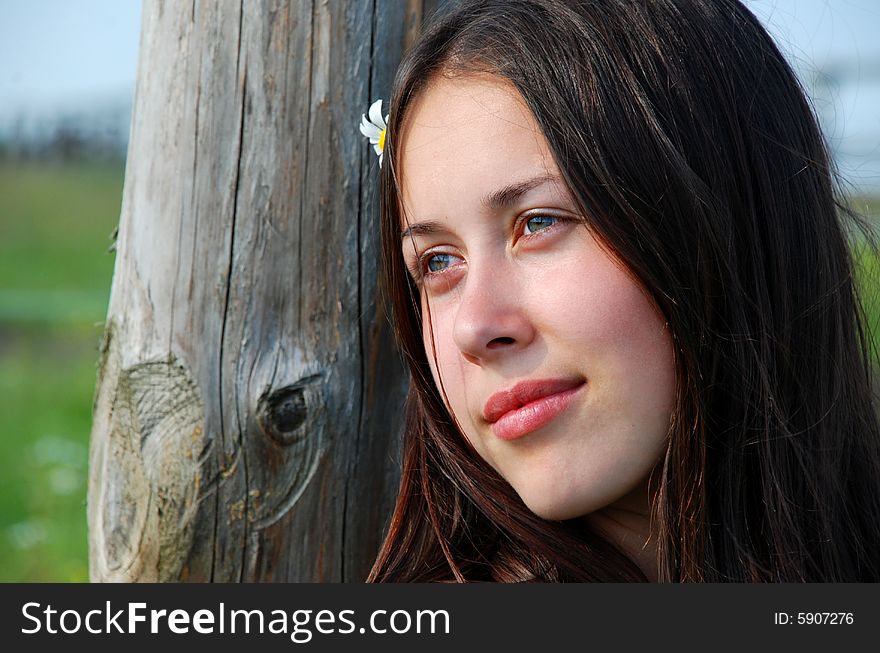 Portrait of the young beautiful woman on the nature. Portrait of the young beautiful woman on the nature