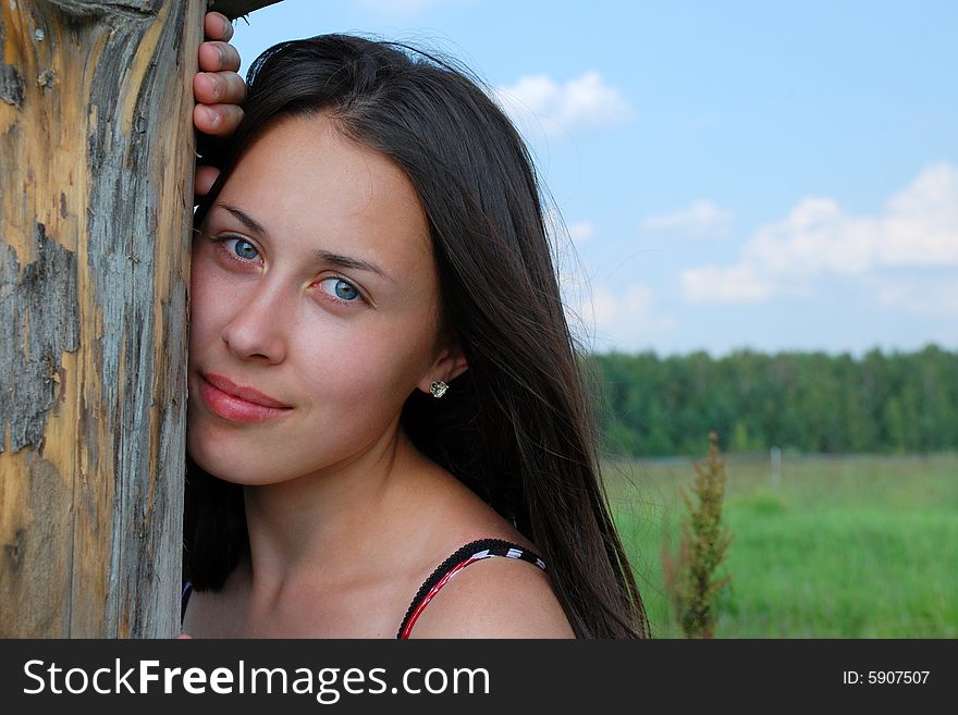 Portrait of the young beautiful woman on the nature. Portrait of the young beautiful woman on the nature
