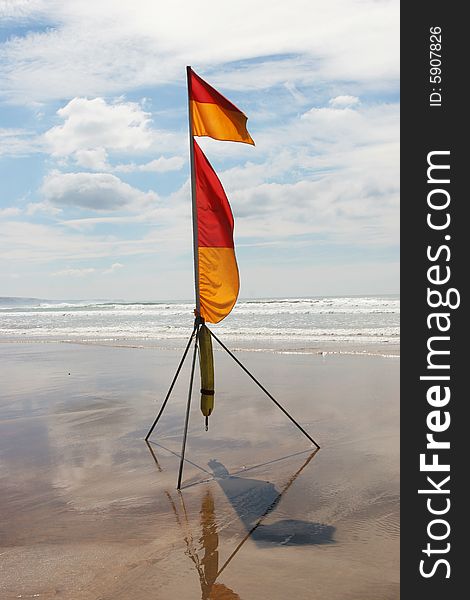 Life guard flag on a beach. Life guard flag on a beach