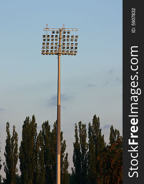 Stadium lights before the sunset