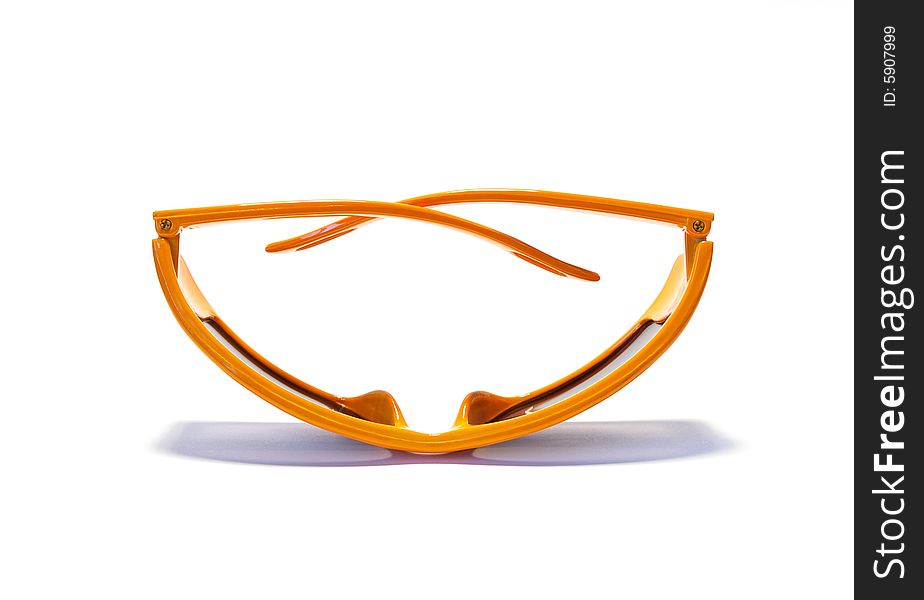 Orange sunglasses isolated on a white background