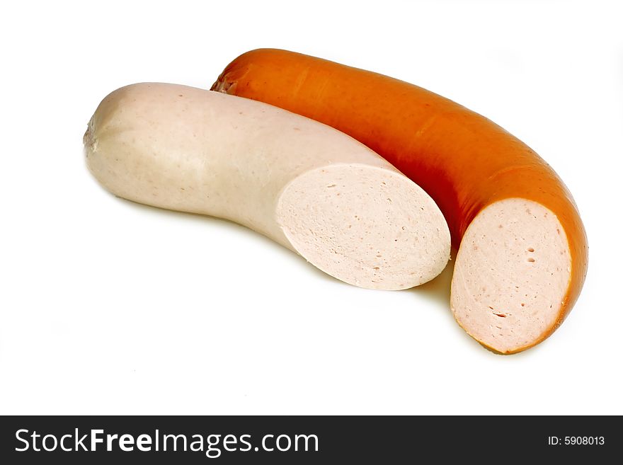 Two sausages on bright background