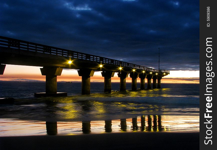 Sunrise at the pier on a winter morning. Sunrise at the pier on a winter morning